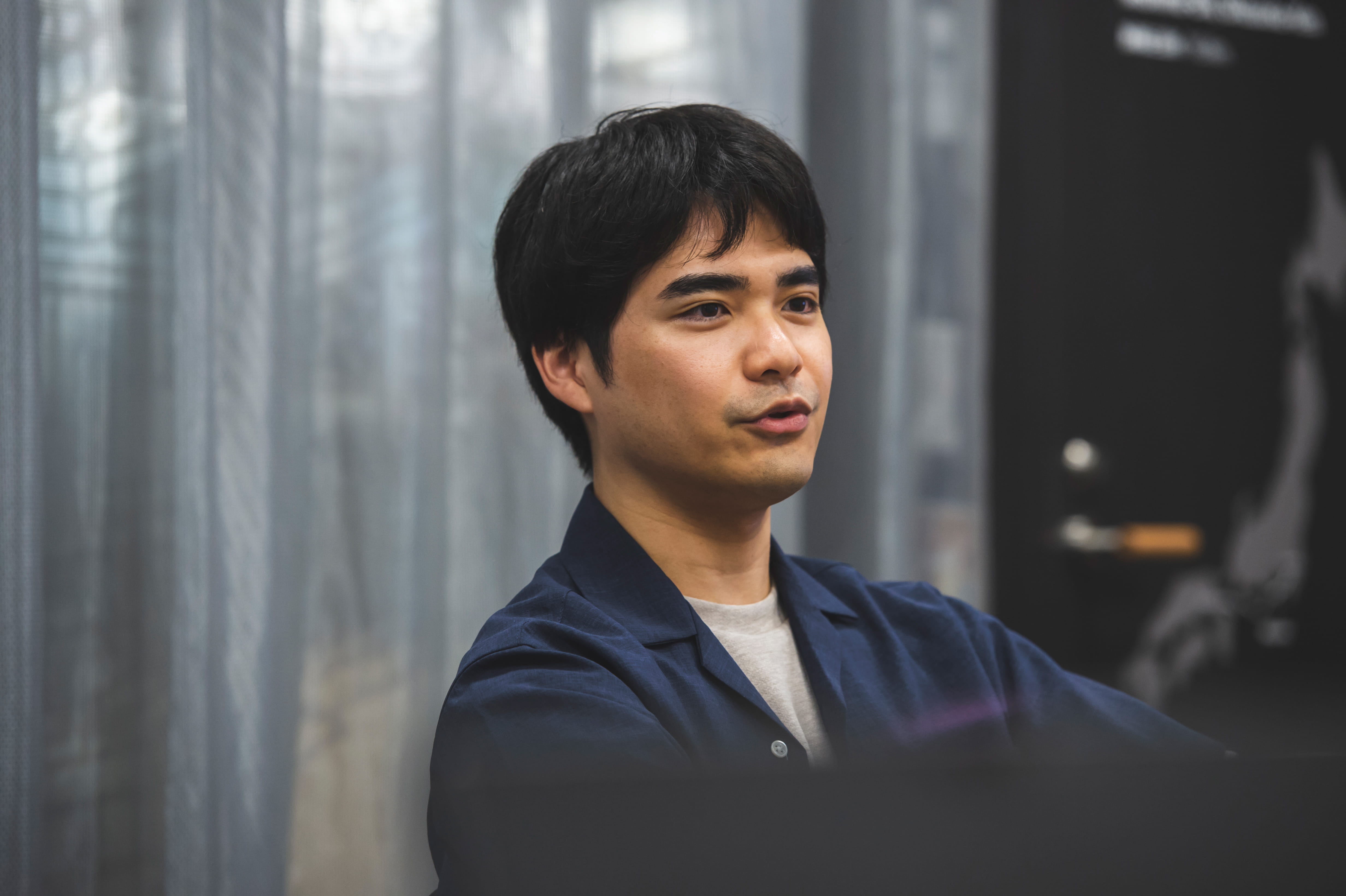 ウーブン・バイ・トヨタ小嶋さんがインタビューで話している様子の写真